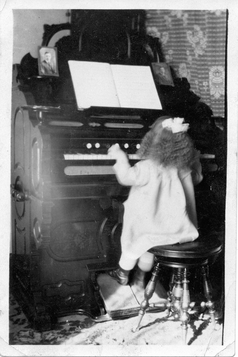 Someone's child playing the organ.