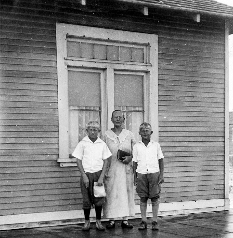 Unknown woman and two sons(?)