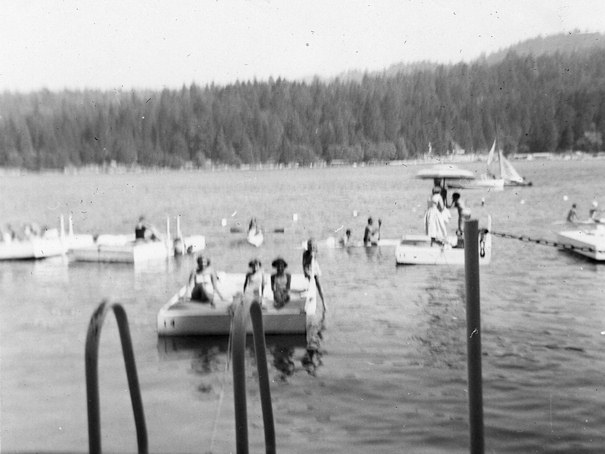 Martha, Sydney Gale, Merrilee, and Tom on a float in Lake Arrowhead.