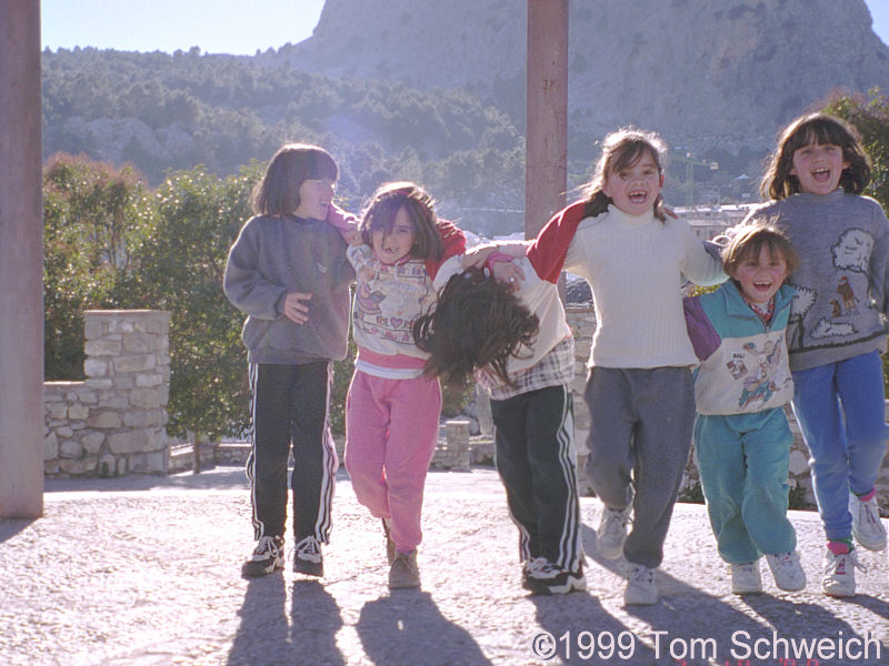 Six little girls entertain us in Grazalema.