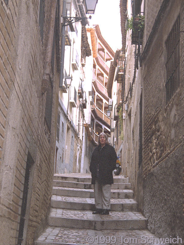 Cheryl in a narrow street in Toledo.