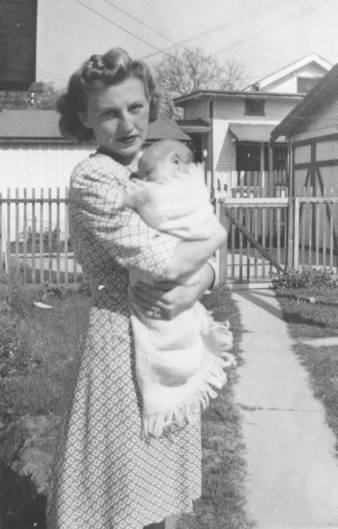 My mother, Lydia, holding my sister Martha